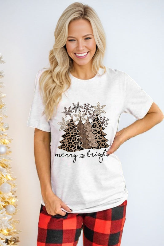 White t-shirt with a Christmas tree design. 